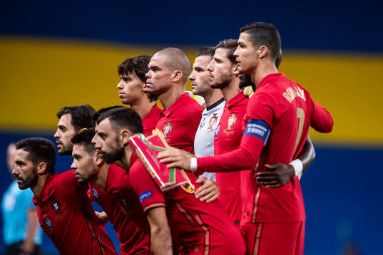 The starting eleven of Portugal pose for a team photo