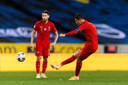 Cristiano Ronaldo of Portugal scores the 0-1 goal