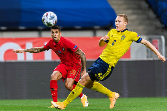 Joao Cancelo of Portugal and Ludwig Augustinsson of Sweden