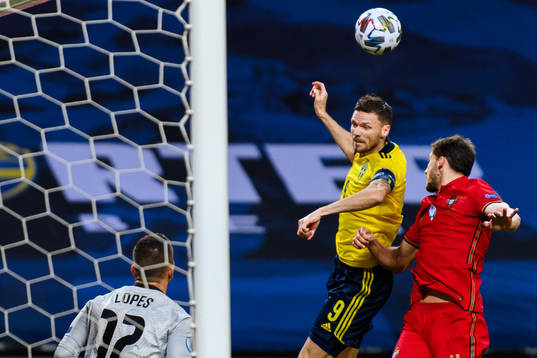 Marcus Berg of Sweden against goalkeeper Anthony Lopes and