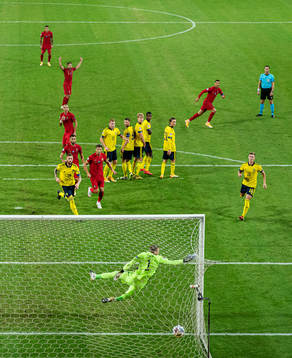 Goalkeeper Robin Olsen of Sweden lets in the 0-1 goal from
