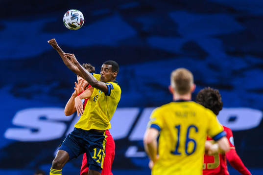 Alexander Isak of Sweden and Ruben Dias of Portugal