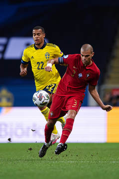 Robin Quaison of Sweden and Pepe of Portugal