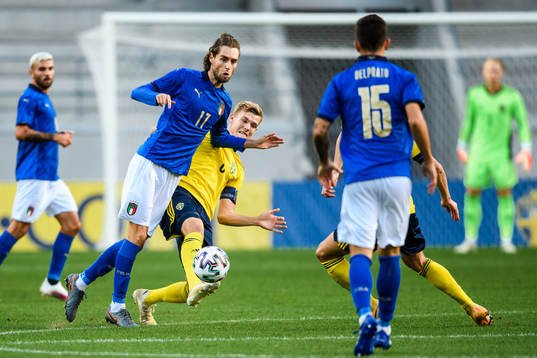 Gianluca Scamacca of Italy and Svante Ingelsson of Sweden