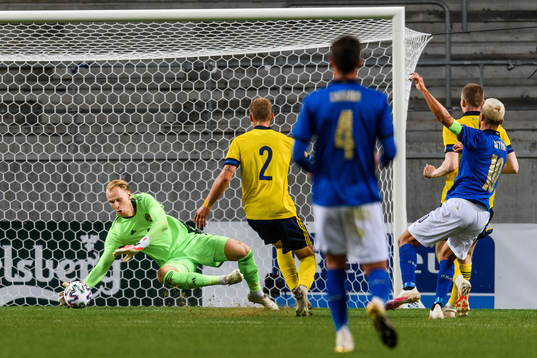Goalkeeper Pontus Dahlberg of Sweden with a save