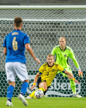 Felix Beijmo and goalkeeper Pontus Dahlberg of Sweden