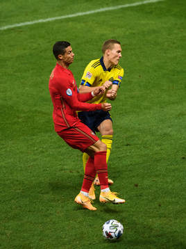 Cristiano Ronaldo of Portugal and Ludwig Augustinsson of