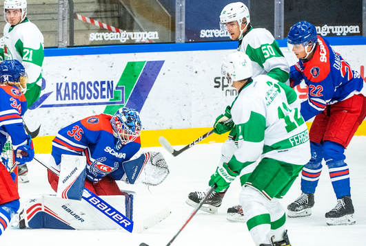 Oskarshamns målvakt Joe Cannata och Rögles Raphael Lavoie