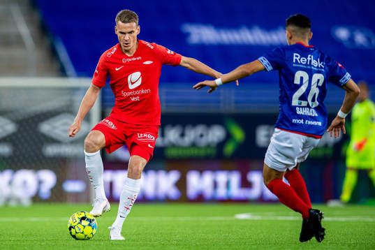 Jon-Helge Tveita of Brann and Osame Sahraoui of Vålerenga