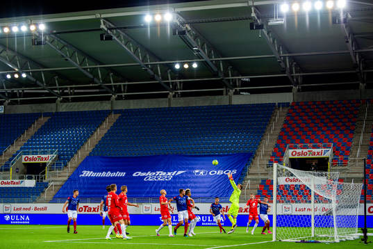 General view of empty seats at Intility Arena as goalkeeper