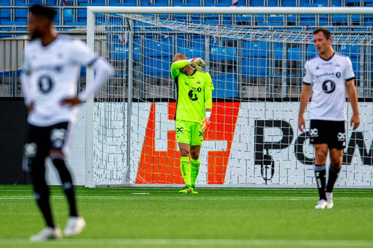 Goalkeeper André Hansen of Rosenborg looks dejected