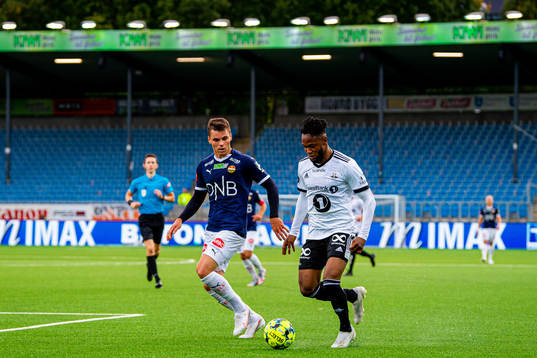 Kristoffer Tokstad of Strømsgodset and Samuel Adegbenro of