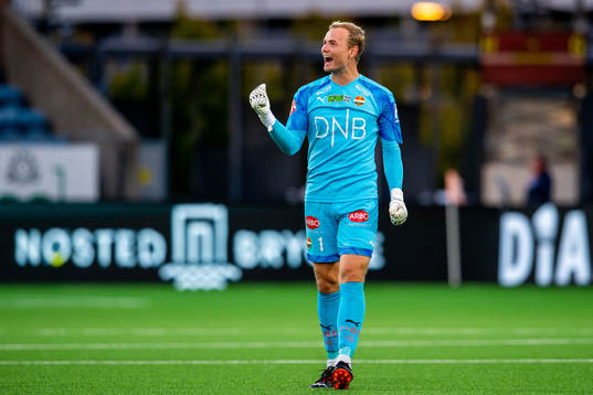 Goalkeeper Viljar Myhra of Strømsgodset celebrates