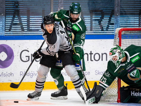 s Fredric Weigel och Färjestads Jesse Virtanen och