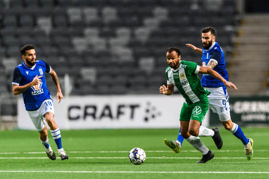 Mikael Ishak of Lech Poznan and Serge-Junior Martinsson