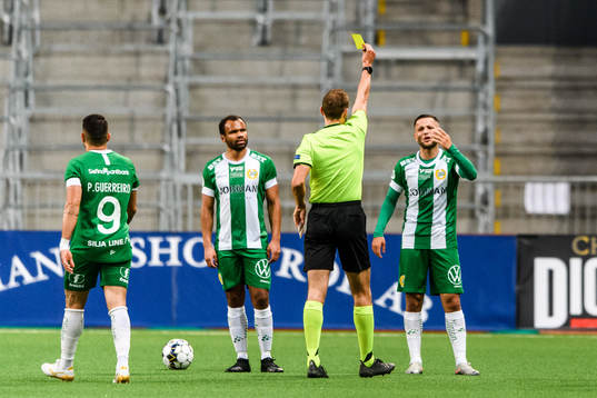 Mohanad Jeahze of Hammarby receives a yellow card from