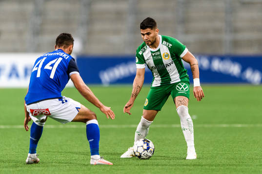 Alan Czerwinski of Lech Poznan and Paulinho of Hammarby