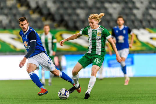 Dorde Crnomarkovic of Lech Poznan and Gustav Ludwigson of