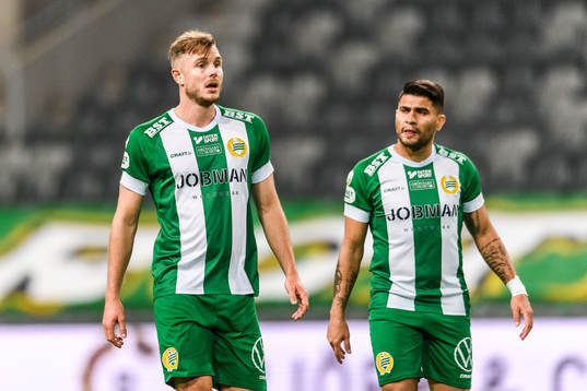 Richard Magyar and Paulinho of Hammarby look dejected