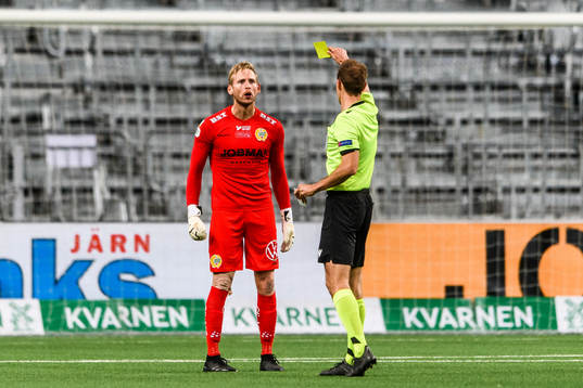 Goalkeeper David Ousted of Hammarby receives a yellow card
