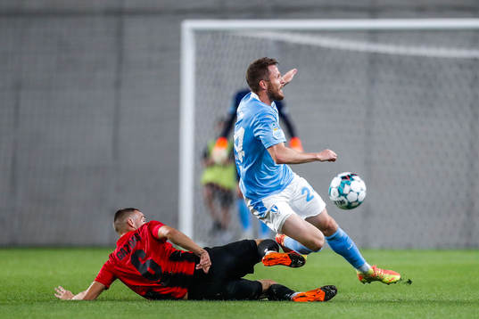 Daniel Gazdag of Budapest Honvéd against Lasse Nielsen of