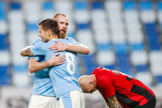Arnór Traustason and Jo Inge Berget of Malmö FF celebrate