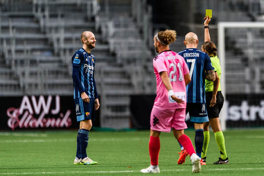 Curtis Edwards of Djurgården receives a yellow card