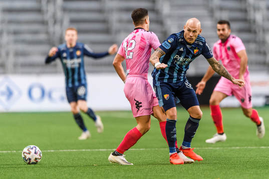 Jayce Olivero of Europa FC and Magnus Eriksson of