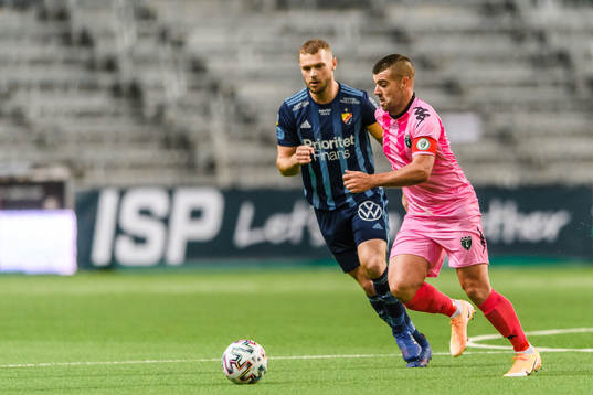 Jesper Karlström of Djurgården and Liam Walker of Europa