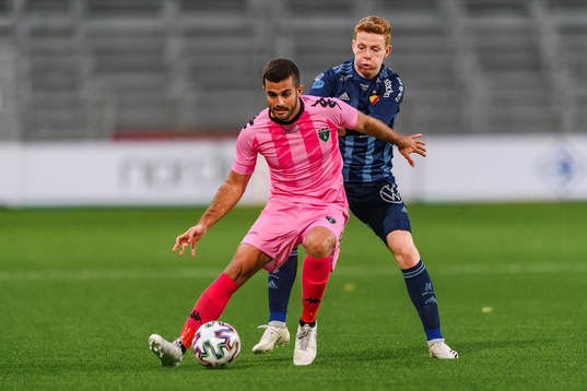 Marco Rosa Blanco of Europa FC and Aslak Witry of