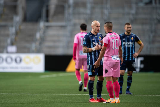 Magnus Eriksson of Djurgården and Liam Walker of Europa FC