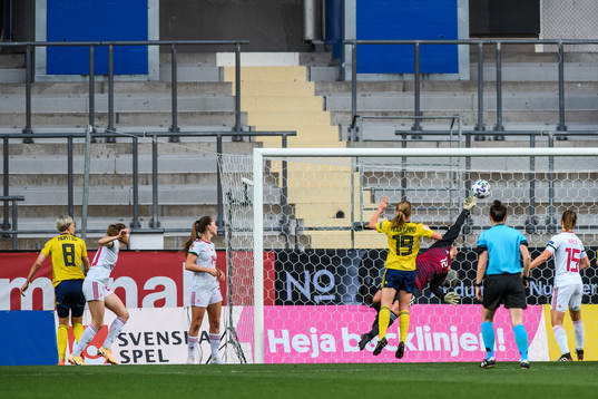 Lina Hurtig of Sweden scores the 1-0 goal behind goalkeeper