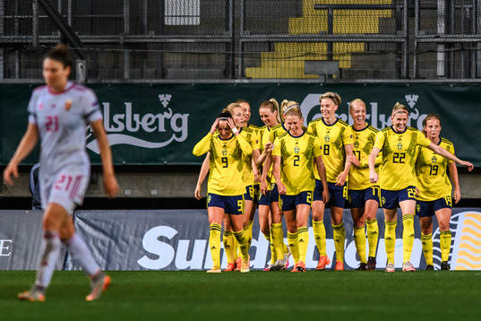 Players of Sweden celebrate the 5-0 goal by Lina Hurtig