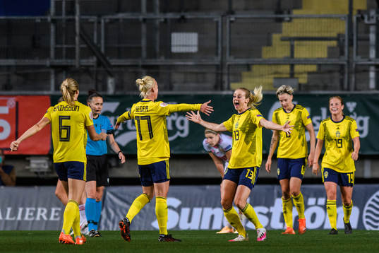 Caroline Seger and Amanda Ilestedt of Sweden celebrate the