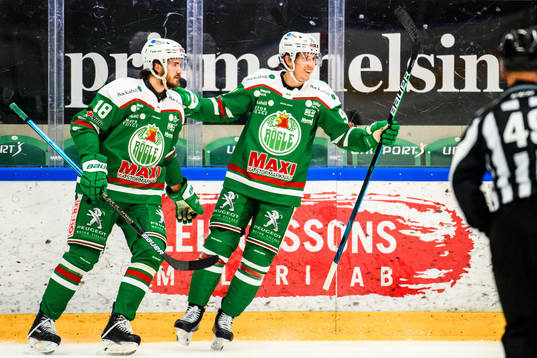 Rögles Dennis Everberg  och Adam Tambellini jublar
