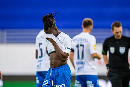 John Shuguto Kitolano of Molde looks dejected
