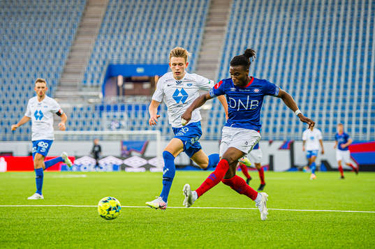 Marcus Holmgren Pedersen of Molde and Samuel Ayomide