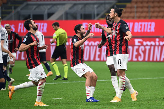 Zlatan Ibrahimovic of AC Milan celebrates with his teammates