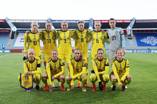 The starting eleven of Sweden pose for a team photo