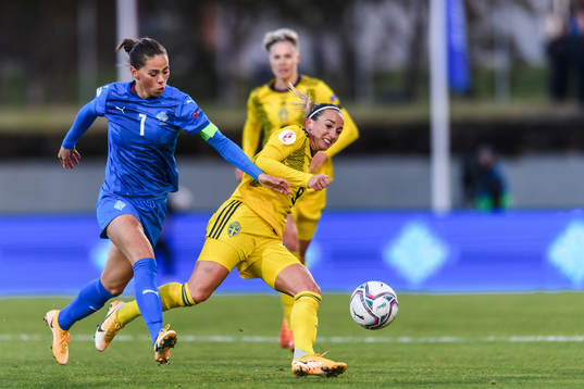 Sara Björk Gunnarsdottir of Iceland and Kosovare Asllani