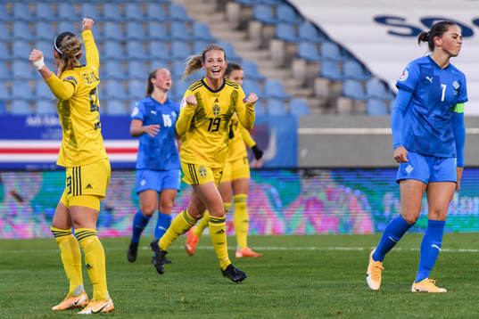 Kosovare Asllani and Anna Anvegård of Sweden celebrate the