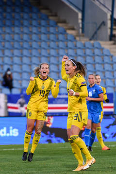 Kosovare Asllani and Anna Anvegård of Sweden celebrate the