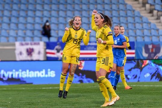 Kosovare Asllani and Anna Anvegård of Sweden celebrate the