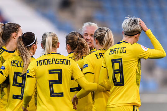 Caroline Seger of Sweden celebrates with Anna Anvegård