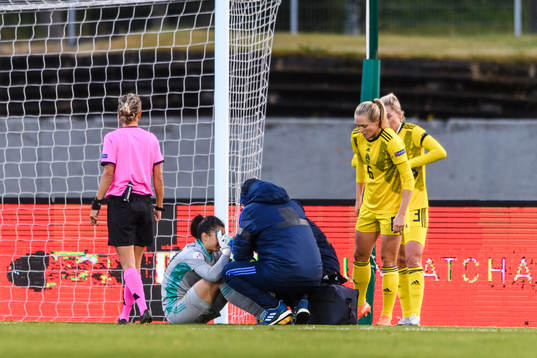 Goalkeeper Zecira Musovic of Sweden in pain