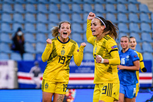 Kosovare Asllani and Anna Anvegård of Sweden celebrate the