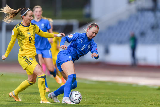 Kosovare Asllani of Sweden and Gunnhildur Yrsa Jonsdottir
