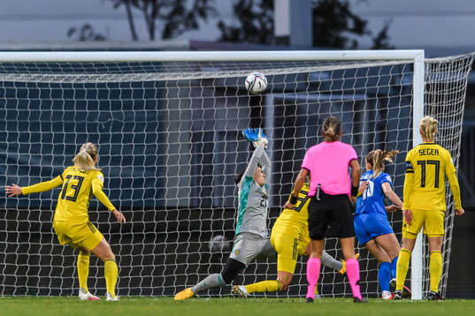 Elin Metta Jensen of Iceland scores the 1-1 goal behind