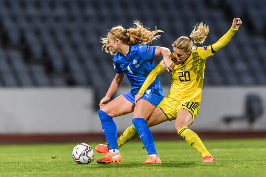 Glodis Perla Viggosdottir of Iceland and Mimmi Larsson of