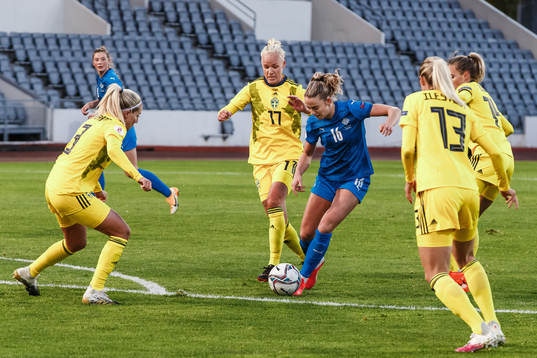 Caroline Seger of Sweden against Elin Metta Jensen of